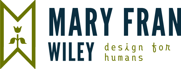 Mary Fran Wiley's logo is a lockup of a shape made of the M&W in her name with a flower inside and her name to the right. It also includes her tagline "design for humans"